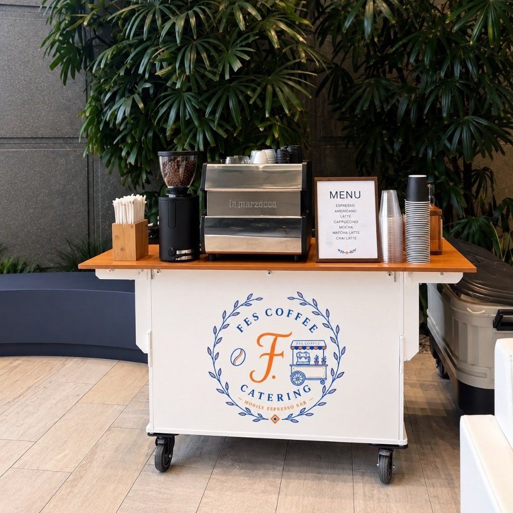 Fes Coffee Catering mobile espresso cart with the menu sign