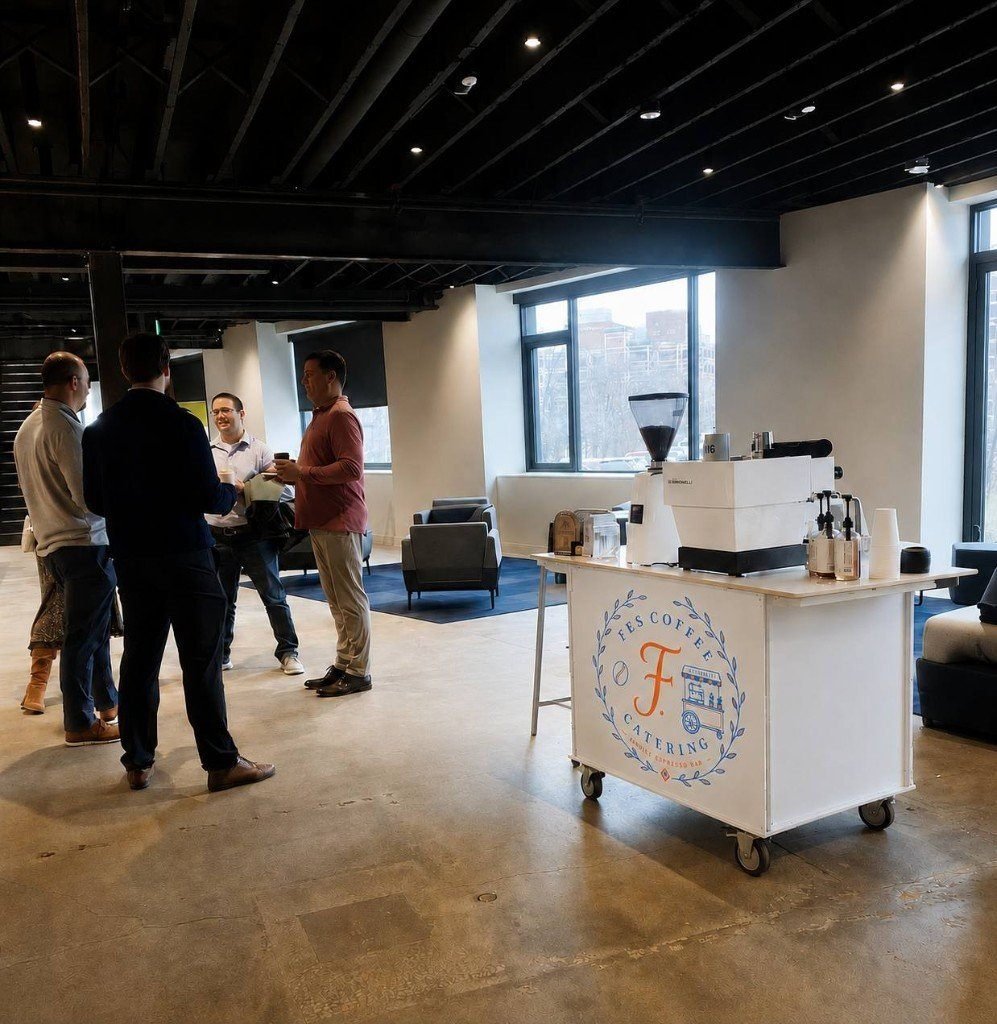 Fes branded coffee cart set up as a mobile espresso bar for an indoor company brand activation in New York City