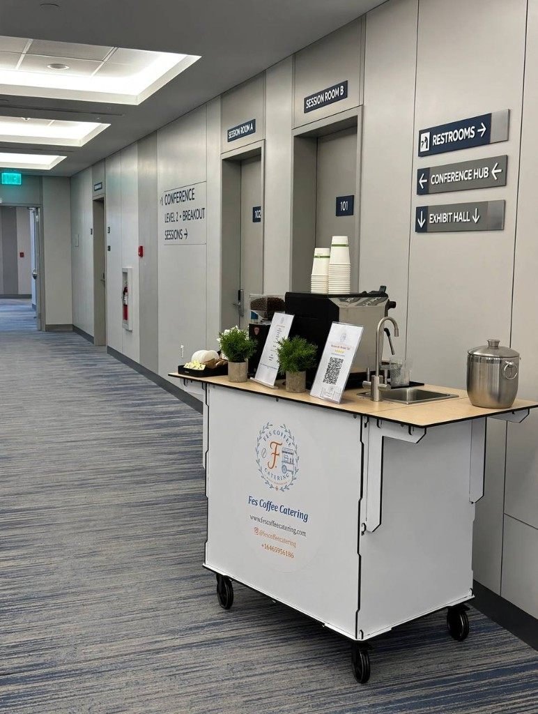 Fes Coffee cart outside conference breakout rooms and the exhibit hall