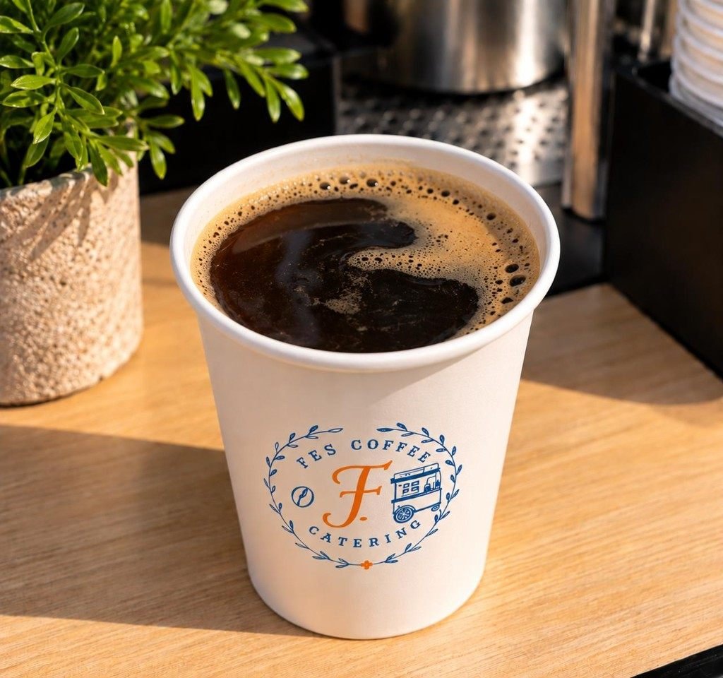 Americano in a Fes Coffee branded cup