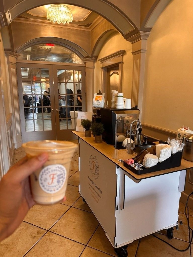 Fes Coffee mobile cart set up in an elegant event venue
