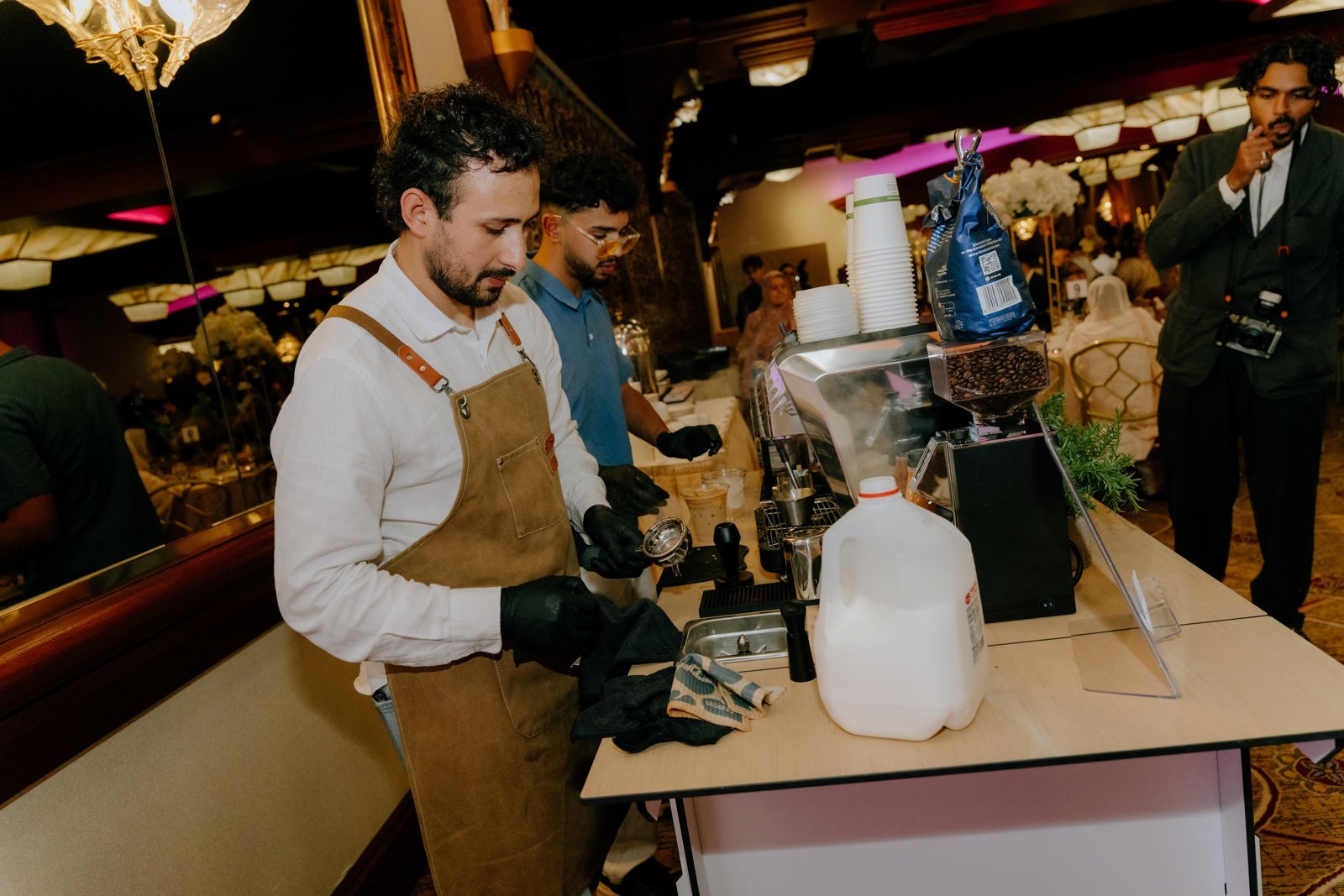 Barista at the Fes Coffee cart at an event